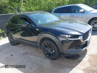 2024 Mazda CX-30 S Select Sport with VIN 3MVDMBBM9RM664856, listed as a IAAI auction lot 42644108 with 35,978 mi miles and . Bid and sale history available at DreamBid. Image 1.