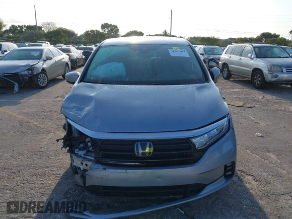 2023 Honda Odyssey Touring with VIN 5FNRL6H86PB020700, listed as a IAAI auction lot 41961098 with 66,512 mi miles and . Bid and sale history available at DreamBid. Image 12.