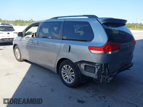 2011 Toyota Sienna XLE AAS with VIN 5TDYK3DC5BS148776, listed as a IAAI auction lot 41525078 with 177,154 mi miles and . Bid and sale history available at DreamBid. Image 3.