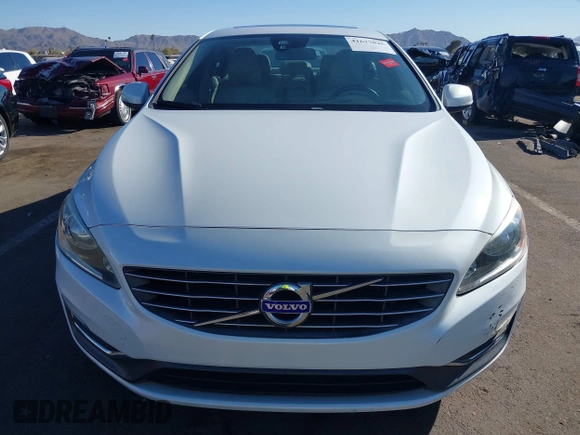 2015 Volvo S60 T5 Drive-E Premier z VIN YV140MFB4F2301427, wystawiony jako IAAI lot #41677045 z przebiegiem 103 262 mil mil oraz . Historia ofert i sprzedaży dostępna na DreamBid. Obrazek 13.