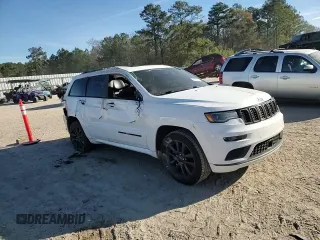 2018 Jeep Grand Cherokee High Altitude with VIN 1C4RJECG1JC125602, listed as a Copart auction lot 88702275 with 59,701 mi miles and Salvage title. Bid and sale history available at DreamBid. Image 11.