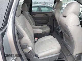 2016 Chevrolet Traverse LT z VIN 1GNKRHKDXGJ115343, wystawiony jako IAAI lot #42246084 z przebiegiem 148 021 mil mil oraz . Historia ofert i sprzedaży dostępna na DreamBid. Obrazek 8.
