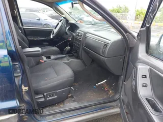 2002 Jeep Grand Cherokee Sport с VIN 1J4GW38S42C166263, выставлен на аукционе IAAI как лот 42521707 с пробегом 267 842 миль миль и . История ставок и продаж доступна на DreamBid. Изображение 5.