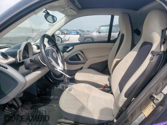 2011 Smart fortwo Pure with VIN WMEEJ3BA4BK447028, listed as a Copart auction lot 57359265 with 84,657 mi miles and Clean title. Bid and sale history available at DreamBid. Image 7.