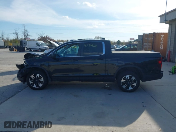 2020 Honda Ridgeline RTL with VIN 5FPYK3F59LB023212, listed as a IAAI auction lot 40704228 with 73,259 mi miles and . Bid and sale history available at DreamBid. Image 15.