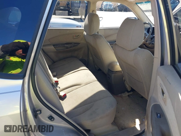 2006 Hyundai Tucson GL with VIN KM8JM12BX6U419239, listed as a IAAI auction lot 41755456 with 88,094 mi miles. Bid and sale history available at carsss.com. Image 8.