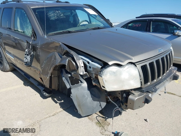 2005 Jeep Grand Cherokee Laredo with VIN 1J4HR48N35C647637, listed as a IAAI auction lot 38514345 with 167,342 mi miles. Bid and sale history available at carsss.com. Image 6.