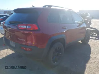 2017 Jeep Cherokee Trailhawk z VIN 1C4PJMBS9HW502323, wystawiony jako IAAI lot #42293817 z przebiegiem 153 127 mil mil oraz . Historia ofert i sprzedaży dostępna na DreamBid. Obrazek 4.