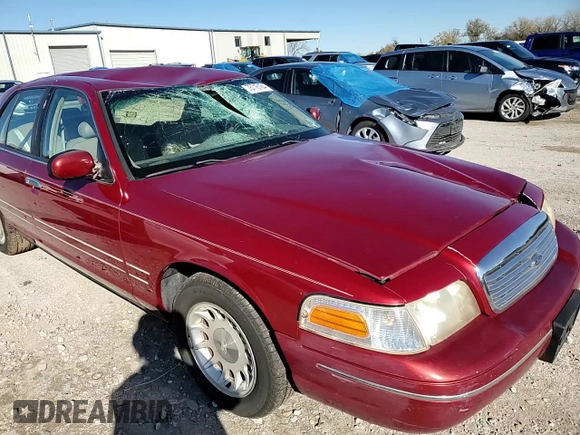 1998 Ford Crown Victoria LX с VIN 2FAFP74W4WX118422, выставлен на аукционе Copart как лот 78716184 с пробегом 70 214 миль миль и Списание • Salvage title. История ставок и продаж доступна на DreamBid. Изображение 11.