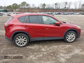 2013 Mazda CX-5 Grand Touring with VIN JM3KE4DE8D0164374, listed as a IAAI auction lot 41820866 with 145,815 mi miles. Bid and sale history available at carsss.com. Image 13.