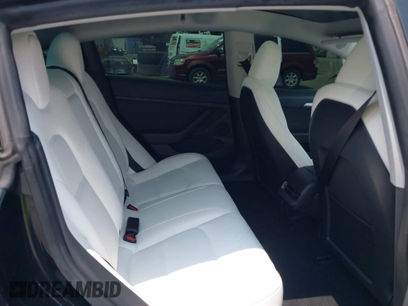 2023 Tesla Model 3 z VIN 5YJ3E1EA4PF565899, wystawiony jako IAAI lot #42436473 z przebiegiem 30 141 mil mil oraz . Historia ofert i sprzedaży dostępna na DreamBid. Obrazek 8.