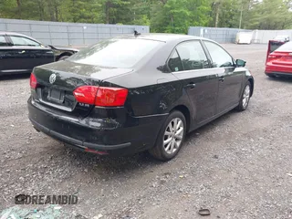 2013 Volkswagen Jetta SE with VIN 3VWDP7AJ7DM212911, listed as a IAAI auction lot 42307323 with 128,745 mi miles and . Bid and sale history available at DreamBid. Image 4.