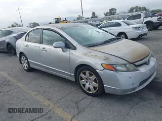 2006 Honda Civic LX with VIN 1HGFA165X6L144003, listed as a IAAI auction lot 42115624 with 310,261 mi miles and . Bid and sale history available at DreamBid. Image 1.