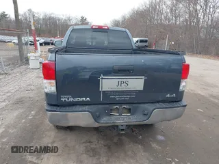 2010 Toyota Tundra with VIN 5TFUM5F16AX005232, listed as a IAAI auction lot 41688311 with 251,296 mi miles and . Bid and sale history available at DreamBid. Image 16.