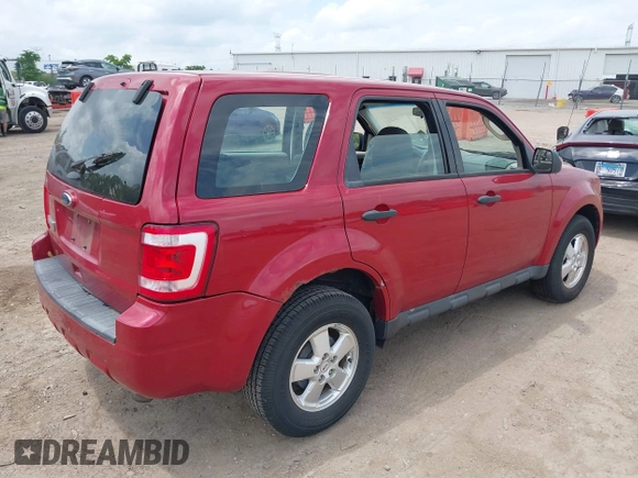 2011 Ford Escape XLS with VIN 1FMCU0C74BKC02739, listed as a IAAI auction lot 42583468 with 221,853 mi miles and . Bid and sale history available at DreamBid. Image 4.