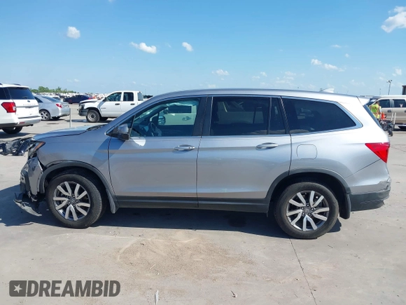 2020 Honda Pilot EX-L with VIN 5FNYF5H46LB004744, listed as a IAAI auction lot 42095298 with 76,159 mi miles and . Bid and sale history available at DreamBid. Image 13.