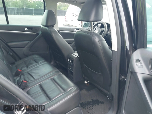 2012 Volkswagen Tiguan S with VIN WVGBV7AX6CW592242, listed as a IAAI auction lot 42215240 with 158,852 mi miles and . Bid and sale history available at DreamBid. Image 8.