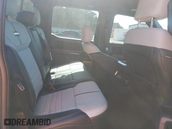 2022 Ford F-150 Lightning Pro z VIN 1FT6W1EV2NWG03314, wystawiony jako Copart lot #48468015 z przebiegiem 10 643 mil mil oraz Czysty tytuł • Clean title. Historia ofert i sprzedaży dostępna na DreamBid. Obrazek 10.