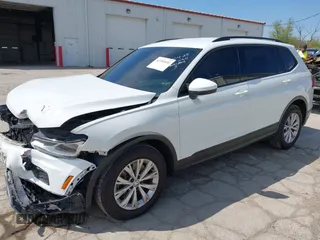 2019 Volkswagen Tiguan S with VIN 3VV0B7AX0KM027036, listed as a IAAI auction lot 42202681 with 75,192 mi miles and . Bid and sale history available at DreamBid. Image 2.
