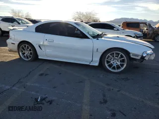 1997 Ford Mustang Cobra with VIN 1FALP47VXVF139807, listed as a Copart auction lot 88045305 with 113,571 mi miles and Salvage Title. Bid and sale history available at carsss.com. Image 4.