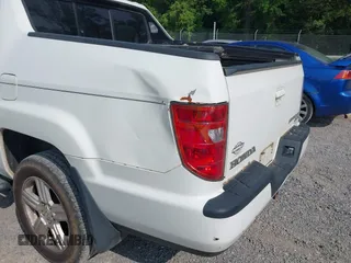 2010 Honda Ridgeline RTL with VIN 5FPYK1F58AB012526, listed as a IAAI auction lot 42421618 with 258,727 mi miles and . Bid and sale history available at DreamBid. Image 6.