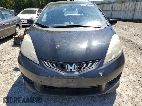 2011 Honda Fit Sport with VIN JHMGE8H57BC024827, listed as a Copart auction lot 59704194 with 146,316 mi miles and Salvage Title. Bid and sale history available at DreamBid. Image 5.