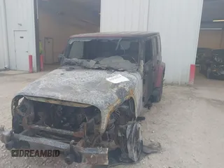 2008 Jeep Wrangler Unlimited Sahara z VIN 1J4GA59188L595981, wystawiony jako IAAI lot #42428134 z przebiegiem Nie podano mil oraz . Historia ofert i sprzedaży dostępna na DreamBid. Obrazek 6.