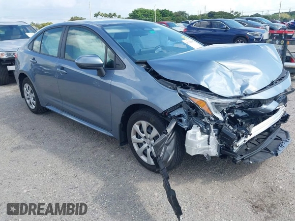 2023 Toyota Corolla Hybrid LE with VIN JTDBCMFE8PJ010693, listed as a IAAI auction lot 41736641 with 10,751 mi miles. Bid and sale history available at carsss.com. Image 1.