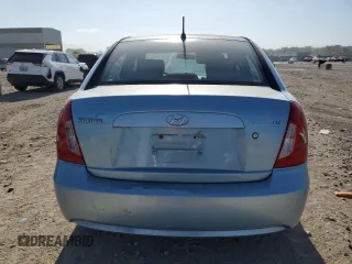 2006 Hyundai Accent GLS z VIN KMHCN46C56U050963, wystawiony jako Copart lot #60979955 z przebiegiem Nie podano mil oraz Czysty tytuł • Clean title. Historia ofert i sprzedaży dostępna na DreamBid. Obrazek 6.