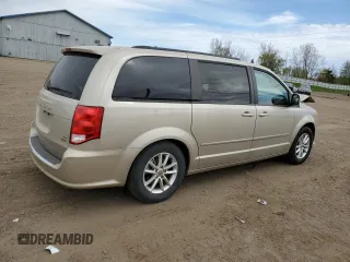 2016 Dodge Grand Caravan SXT with VIN 2C4RDGCGXGR312372, listed as a Copart auction lot 54943615 with 127,576 mi miles and Clean Title. Bid and sale history available at DreamBid. Image 3.
