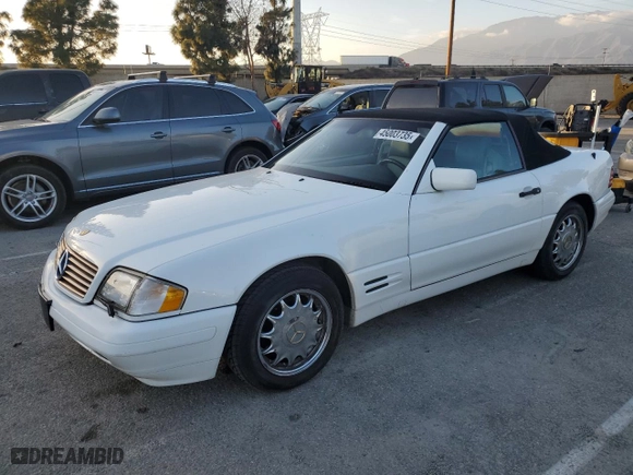 1997 Mercedes-Benz SL-Class with VIN WDBFA63F5VF143197, listed as a Copart auction lot 45003735 with 100,250 mi miles and Salvage Title. Bid and sale history available at carsss.com. Image 1.