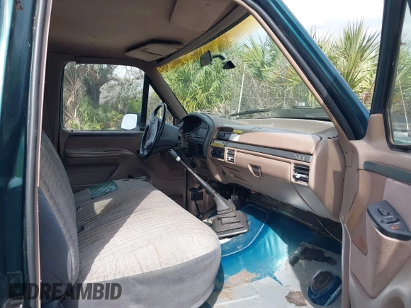 1993 Ford F-150 z VIN 1FTEX15N7PKB65960, wystawiony jako IAAI lot #41306323 z przebiegiem Nie podano mil oraz . Historia ofert i sprzedaży dostępna na DreamBid. Obrazek 5.