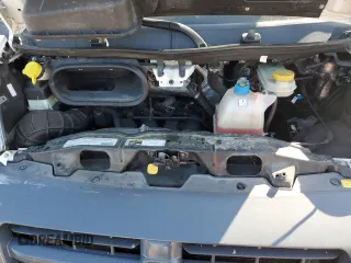 2018 Ram ProMaster Cargo with VIN 3C6TRVAGXJE105060, listed as a Copart auction lot 52821724 with 100,477 mi miles and Salvage Title. Bid and sale history available at DreamBid. Image 12.