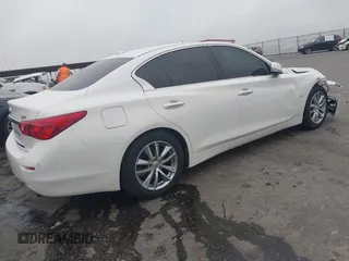 2015 Infiniti Q50 Premium z VIN JN1BV7AP9FM331131, wystawiony jako IAAI lot #41786108 z przebiegiem 176 874 mil mil oraz . Historia ofert i sprzedaży dostępna na DreamBid. Obrazek 4.
