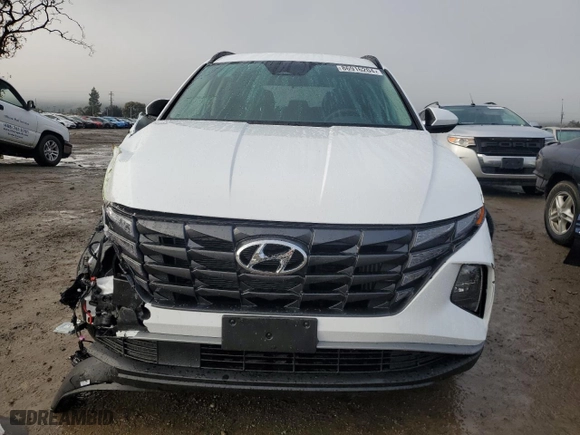 2024 Hyundai Tucson Hybrid Blue with VIN KM8JBCD13RU237800, listed as a Copart auction lot 86916204 with 618 mi miles and Salvage Title. Bid and sale history available at carsss.com. Image 5.