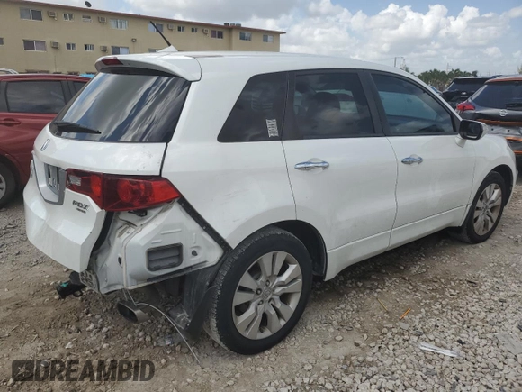 2012 Acura RDX with VIN 5J8TB2H28CA000854, listed as a Copart auction lot 66872064 with 167,558 mi miles and Salvage Title. Bid and sale history available at carsss.com. Image 3.