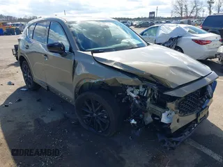 2024 Mazda CX-5 Carbon Edition with VIN JM3KFBAYXR0371954, listed as a IAAI auction lot 41688598 with 13,230 mi miles and . Bid and sale history available at DreamBid. Image 1.