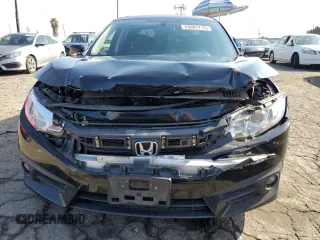 2018 Honda Civic EX-T z VIN JHMFC1F38JX018777, wystawiony jako Copart lot #43087715 z przebiegiem 143 847 mil mil oraz Szkoda całkowita • Salvage title. Historia ofert i sprzedaży dostępna na DreamBid. Obrazek 5.