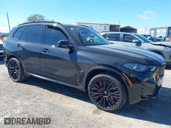 2025 BMW X5 sDrive40i with VIN 5UX13EU01S9W88784, listed as a IAAI auction lot 41631766 with 12,805 mi miles. Bid and sale history available at carsss.com. Image 1.