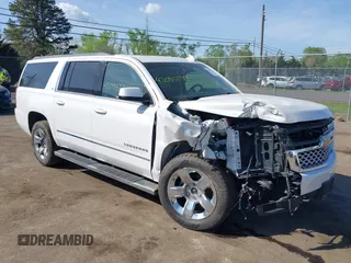 2018 Chevrolet Suburban LT z VIN 1GNSKHKC9JR281860, wystawiony jako IAAI lot #42095234 z przebiegiem 82 563 mil mil oraz . Historia ofert i sprzedaży dostępna na DreamBid. Obrazek 1.