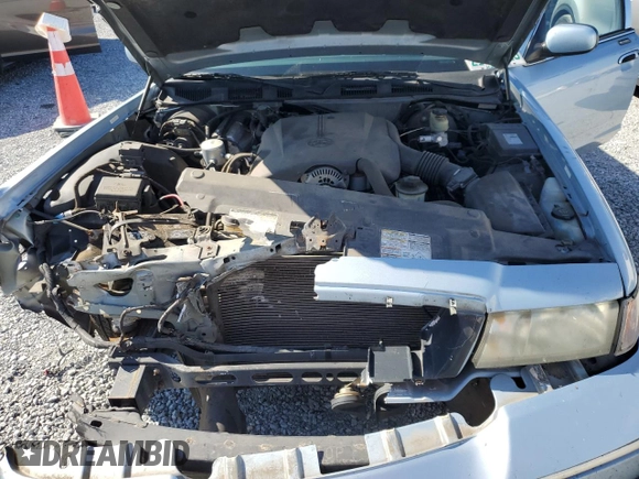 1999 Mercury Grand Marquis GS z VIN 2MEFM74W5XX711421, wystawiony jako Copart lot #53062605 z przebiegiem 106 913 mil mil oraz Nie do naprawy • Non repairable. Historia ofert i sprzedaży dostępna na DreamBid. Obrazek 12.