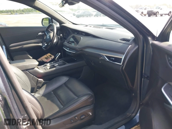 2021 Cadillac XT4 FWD Premium Luxury with VIN 1GYFZCR42MF007617, listed as a IAAI auction lot 42437974 with 126,071 mi miles and . Bid and sale history available at DreamBid. Image 5.