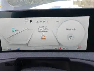 2023 Kia EV6 Wind z VIN KNDC34LA9P5127293, wystawiony jako IAAI lot #41711613 z przebiegiem 12 365 mil mil oraz . Historia ofert i sprzedaży dostępna na DreamBid. Obrazek 7.