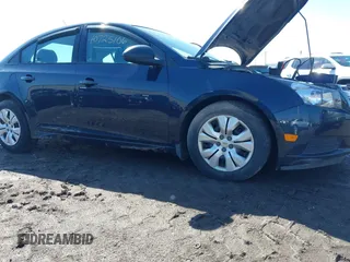 2014 Chevrolet Cruze LS with VIN 1G1PA5SG2E7329311, listed as a IAAI auction lot 40725106 with 95,222 mi miles and . Bid and sale history available at DreamBid. Image 6.