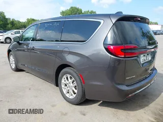2023 Chrysler Pacifica Touring L with VIN 2C4RC1BG6PR612749, listed as a IAAI auction lot 42612932 with 69,931 mi miles and . Bid and sale history available at DreamBid. Image 3.