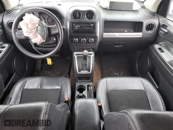 2014 Jeep Compass Latitude with VIN 1C4NJDEB9ED911237, listed as a Copart auction lot 85651674 with Not Provided miles and Salvage Title. Bid and sale history available at DreamBid. Image 8.