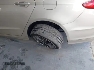 2018 Ford Fusion Titanium с VIN 3FA6P0D98JR268784, выставлен на аукционе IAAI как лот 42257897 с пробегом 145 446 миль миль и . История ставок и продаж доступна на DreamBid. Изображение 6.