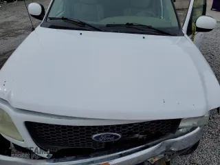 2002 Ford F-150 XLT with VIN 1FTRW08L32KA76808, listed as a Copart auction lot 45020845 with 165,599 mi miles and Salvage Title. Bid and sale history available at carsss.com. Image 14.