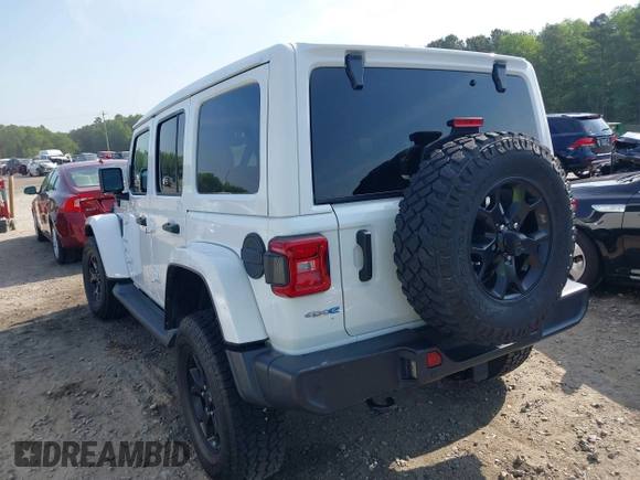 2021 Jeep Wrangler Unlimited Sahara z VIN 1C4JJXP6XMW840844, wystawiony jako IAAI lot #42152271 z przebiegiem 68 209 mil mil oraz . Historia ofert i sprzedaży dostępna na DreamBid. Obrazek 3.