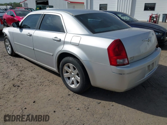 2006 Chrysler 300 Touring with VIN 2C3KA53G26H459048, listed as a IAAI auction lot 42049103 with 256,564 mi miles. Bid and sale history available at carsss.com. Image 3.
